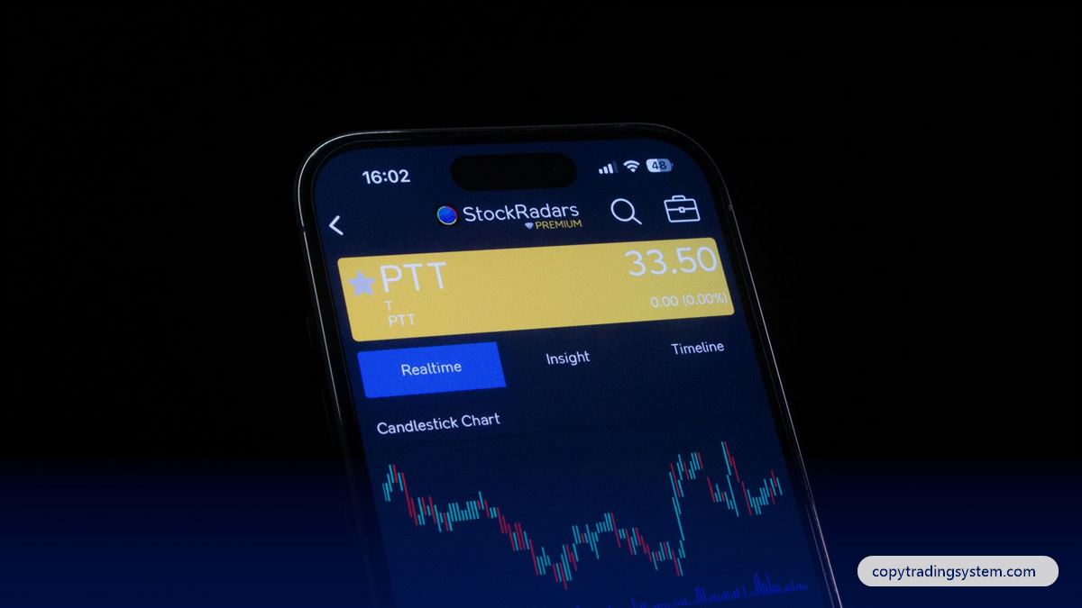 Choosing a copy trading platform: a smartphone showing a trading app